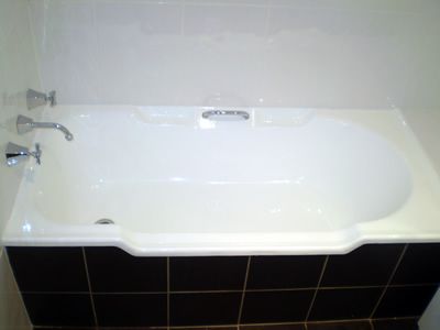 After: a discoloured bath