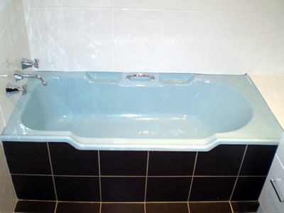 Before: a discoloured bath