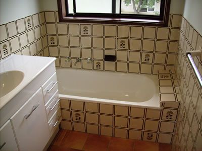 Before: a resprayed bathroom